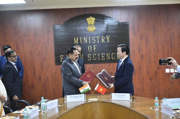 Minister signing the MoU