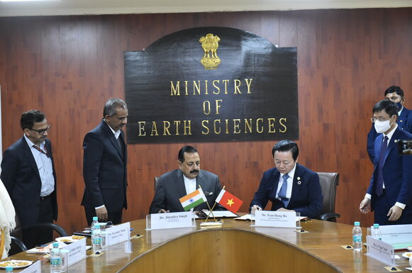 Minister signing the MoU